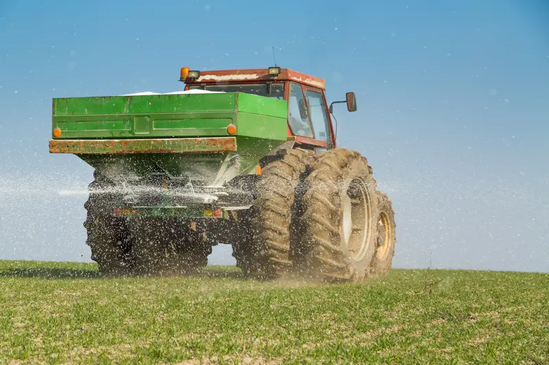 Photo of famer fertilizing